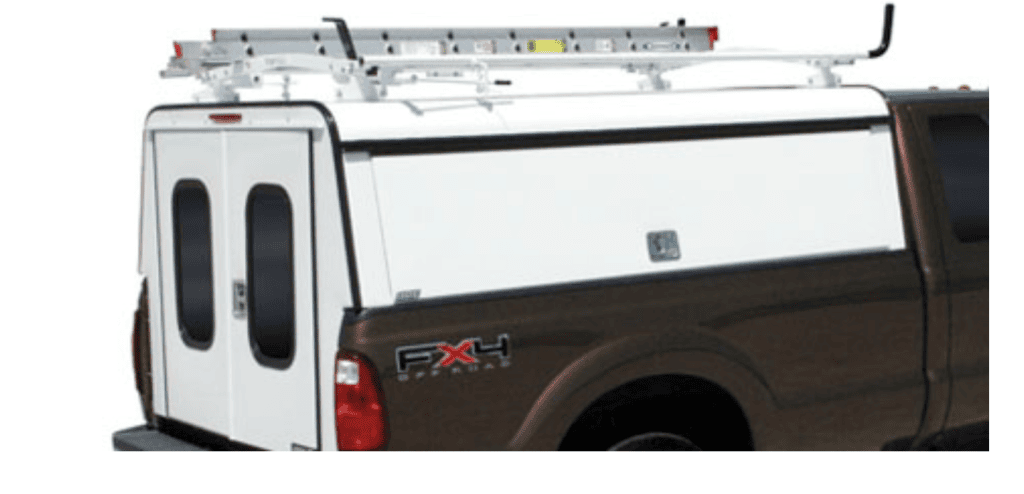 Durable truck bed storage with secure compartments and ladders, ideal for commercial and sports vehicles.