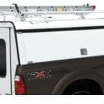 Durable truck bed storage with secure compartments and ladders, ideal for commercial and sports vehicles.
