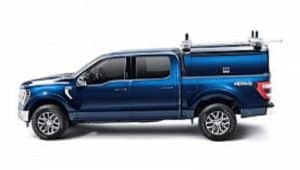 Blue utility truck with equipment rack for sports services.
