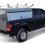 High-quality work truck with roof racks and storage canopy for utility and durability.