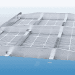 Aluminum industrial drainage grate for sports center flooring.