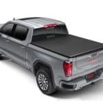 GMC Sierra pickup truck with tonneau cover, ideal for outdoor adventures and cargo transport.