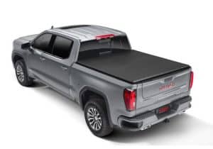GMC Sierra pickup truck with tonneau cover, ideal for outdoor adventures and cargo transport.