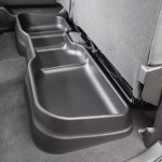 Back seat fold-out storage tray for convenient organization and easy access in vehicles.