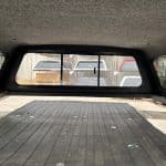 View of truck bed with cover installed on Nissan Titan 78.7" PNT.