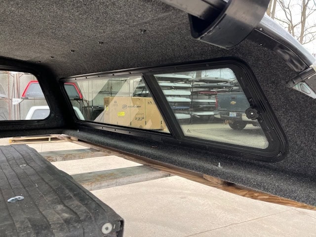 Truck bed cap with side windows for Nissan Titan 78.7" model.