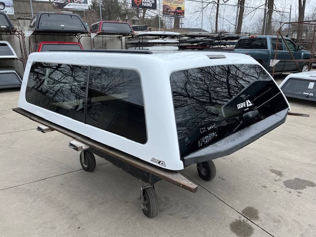 White truck cap with tinted windows for F150 79" bed.