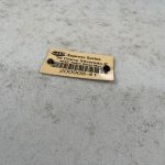 Chevy 1500 8' cap paint code label on truck bed surface.