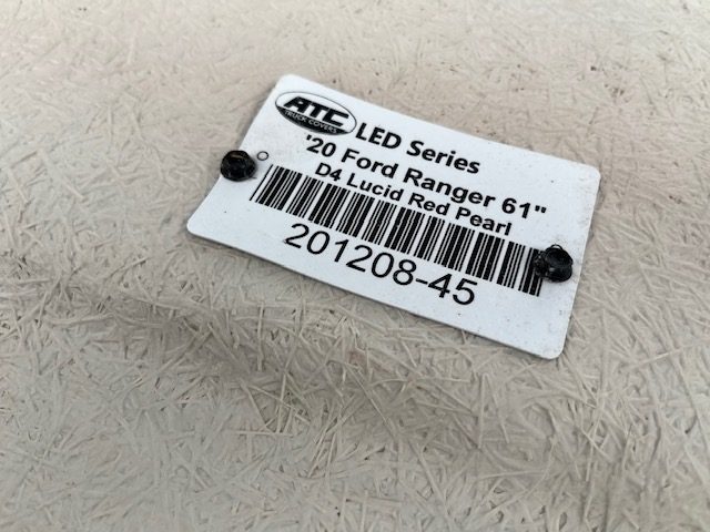 Label for Ford Ranger 60" cap in Lucid Red with barcode and details.