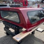 Red truck bed cap for Ford Ranger 60" with tinted windows.