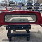 Red Ford Ranger 60-inch truck cap with rear window for sale.
