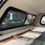 Ford Ranger 60" truck cap with tinted windows in Lucid Red color.