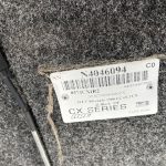 Truck bed cover with serial number label for Chevy 1500.