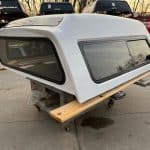 Summit white truck camper top with large windows for Chevy HD 14-19 models.