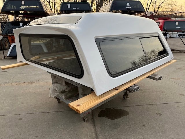 Summit white truck camper top with large windows for Chevy HD 14-19 models.