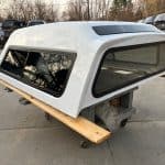 Summit white truck cap with tinted windows for Chevy HD 14-19 models.