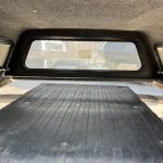 Truck bed cap with rear window for RAM 1500 76" bed.
