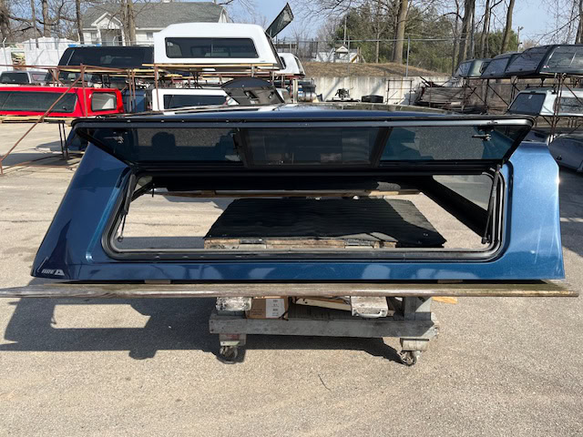 Northsky blue truck cap with open rear window for Chevy 1500.