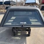 Gray GMC 1500 truck cap with window for DEMO 14-19 GMC 1500.