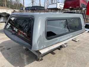 New RAM 1500 truck body in ceramic gray for sale at Camp and Cruise.