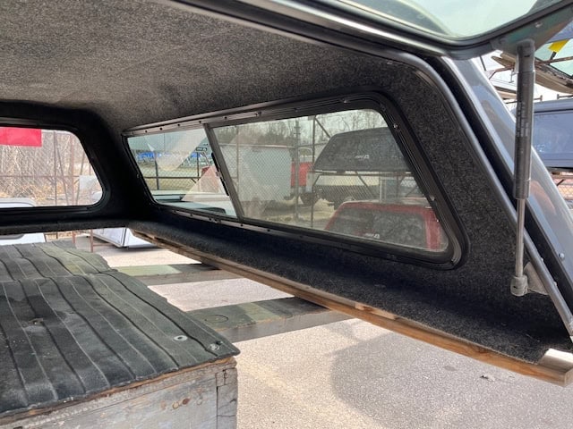 Truck cap with window and interior view for RAM 1500.