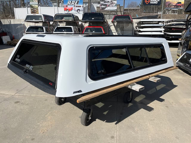 Summit white truck cap for Chevy HD 98" with tinted windows and aerodynamic design.
