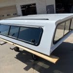 Summit white truck cap for Chevy HD 98" with tinted windows.