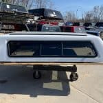 Summit white camper shell for Chevy HD 98" truck, outdoor storage solution.