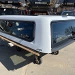 Summit white truck cap for Chevy HD 98" with tinted windows and aerodynamic design.
