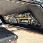 Side truck bed window on a Chevy HD in Summit White color.