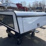 White truck bed cap with rear window for RAM 1500 67" bed.