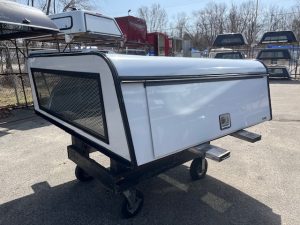 White truck bed cap with rear window for RAM 1500 67" bed.