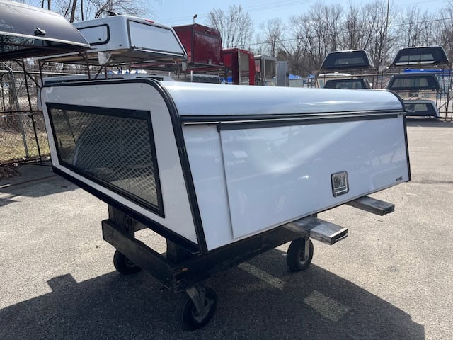 White truck bed cap with rear window for RAM 1500 67" bed.