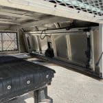 Durable truck bed storage solution for RAM 1500 67" with white color.