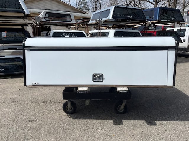 White utility truck bed for Ford SD 81" with storage compartments.