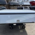 White truck bed toolbox for Ford SD 81" with lock and wheels.