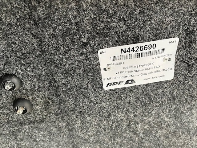 Gray truck part with barcode and serial number N4426690.