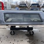 Gray truck bed cap with tinted window for Ford F150 79".