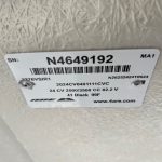 Chevy HD truck bed with serial number N4649192 in black color.
