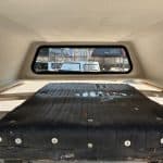 Chevy HD 82-inch bed cover with rear window view.