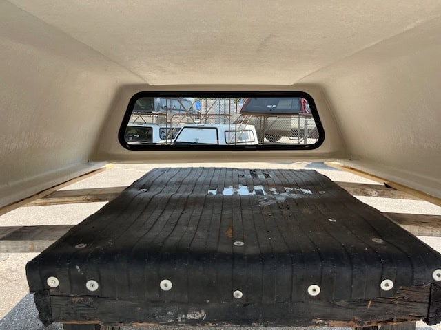 Chevy HD 82-inch bed cover with rear window view.