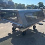 G9K Satin Steel Gray truck cap with tinted windows for Chevy 1500.