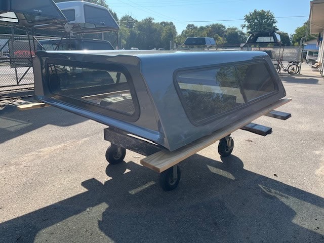 G9K Satin Steel Gray truck cap with tinted windows for Chevy 1500.