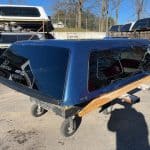 Blue truck cap with wooden accents for GMC HD 82.2" PNT.
