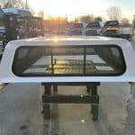 Chevy 82-inch truck cap in Summit White for Silverado models.