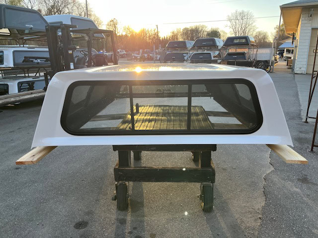 Chevy 82-inch truck cap in Summit White for Silverado models.