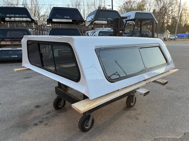Chevy 82-inch truck cap in Summit White for Silverado models.