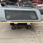 Chevy 1500 truck cap with 70'' Sharkskin color, model N4469278, on display at Camp and Cruise.