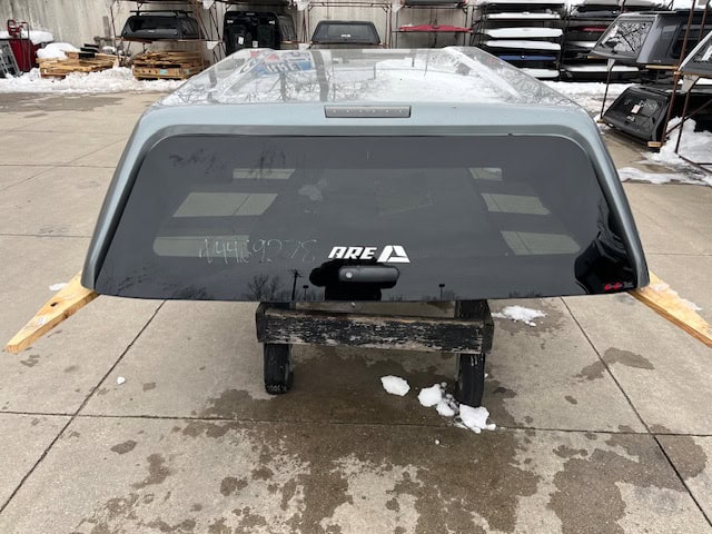 Camp and Cruise Chevy 1500 truck cap in Sharkskin color for pickup trucks.