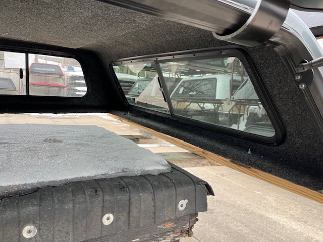 Camp and Cruise truck bed cap for Chevy 1500 in Sharkskin color.